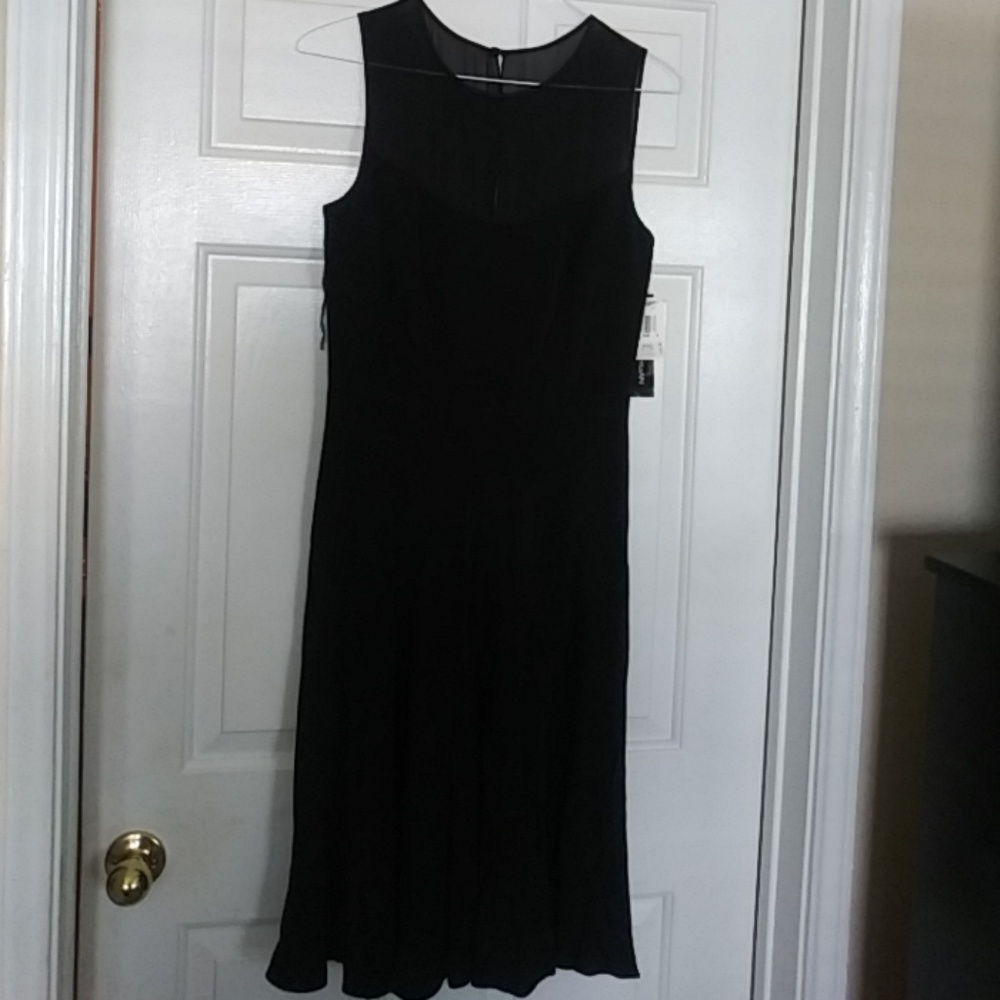 Black sleeveless dress with sheer declate